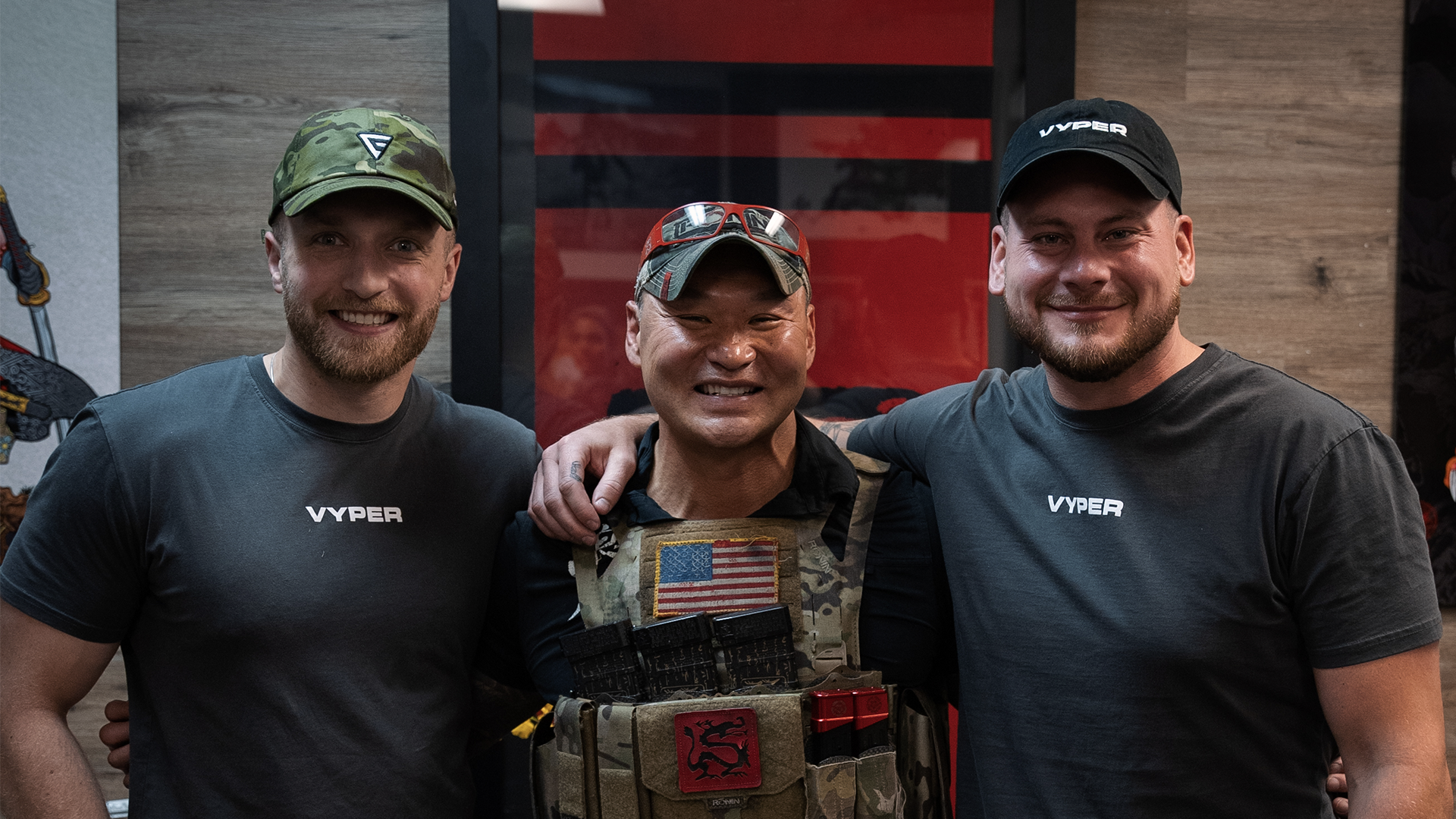 Red and black ronin x vyper chair on black and gray camo background with gray and black ronin logo in center